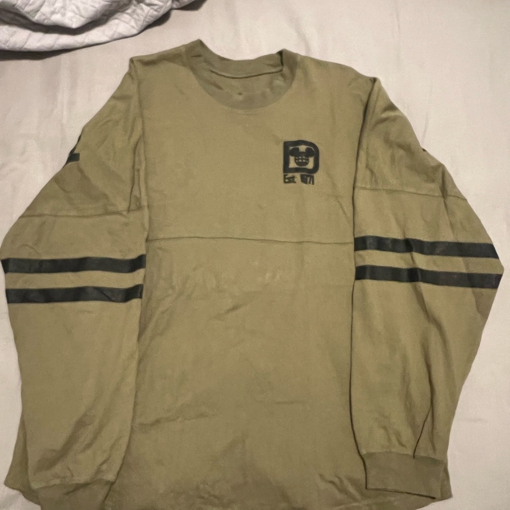 Walt Disney world Olive spirit jersey